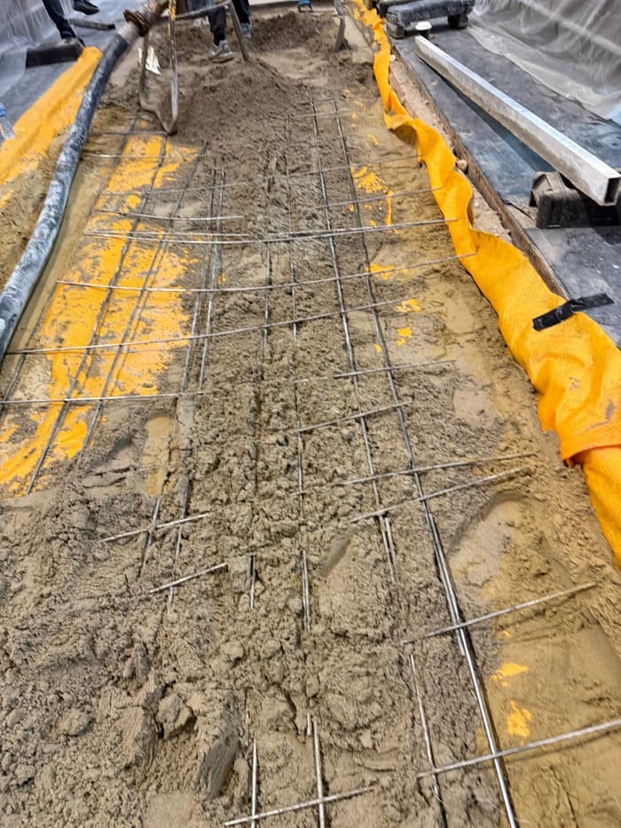 Preparing the floor base with membrane and grid